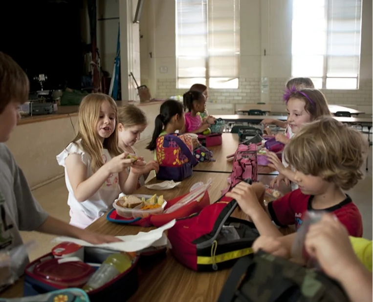 Children enjoying a meal together at ABC Day Nursery